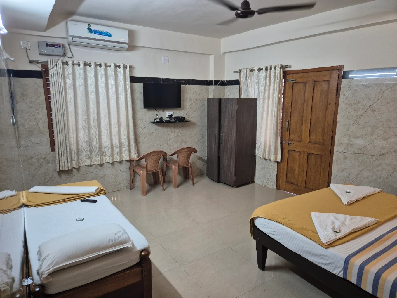 Comfortable guest room at Sri Brindavan Gardens